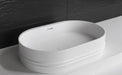Foggie 55 Designer Solid Surfaces Overcounter Washbasin Foggia系列55CM橢圓型人造石設計師檯上式臉盆採用特別溢水設計