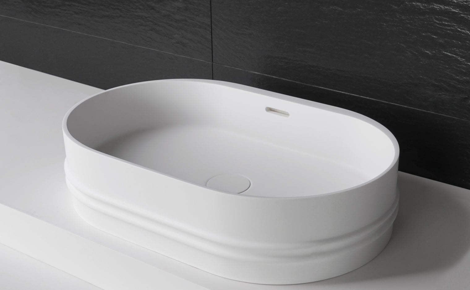 Foggie 55 Designer Solid Surfaces Overcounter Washbasin Foggia系列55CM橢圓型人造石設計師檯上式臉盆採用特別溢水設計